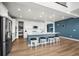 Modern kitchen with stainless steel appliances, a large island, and ample counter space at 14651 Dahlia Way, Thornton, CO 80602