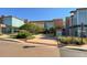 The exterior of a shopping center features a Macy's department store at 14651 Dahlia Way, Thornton, CO 80602