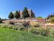 Well-maintained landscaping at The Orchard shopping center at 14651 Dahlia Way, Thornton, CO 80602