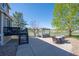 Backyard featuring a patio with a hot tub, outdoor seating, and a well-manicured lawn at 8700 Ehler Pkwy, Brighton, CO 80602
