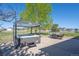 Backyard with a hot tub, outdoor seating, a patio, and scenic views of the surrounding landscape at 8700 Ehler Pkwy, Brighton, CO 80602
