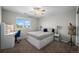 Bedroom with a bed with drawers, a study desk, and a window with neighborhood views at 8700 Ehler Pkwy, Brighton, CO 80602