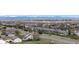 Scenic view of a residential neighborhood with mountain views at 8700 Ehler Pkwy, Brighton, CO 80602