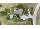 Overhead aerial shot of the home's layout, driveway, and lush, spacious surroundings at 12189 N Boot Hill Dr, Parker, CO 80138