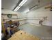 Unfinished basement with overhead lighting and available workspace at 12189 Boot Hill Dr, Parker, CO 80138