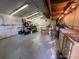 Unfinished basement with overhead lighting, work bench, and storage at 12189 Boot Hill Dr, Parker, CO 80138