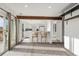 Bright living room featuring a breakfast bar with barstools and sliding glass doors to let light in at 4899 S Dudley St # 3, Littleton, CO 80123