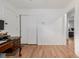 Spacious room with hardwood floors and ample closet space, perfect for a bedroom or office at 396 Tucson St, Aurora, CO 80011