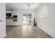 Dining room featuring tile flooring, sliding glass door, and a ceiling fan at 396 Tucson St, Aurora, CO 80011