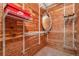 Walk-in closet with custom shelving and cedar walls at 13782 E Lehigh Ave # H, Aurora, CO 80014