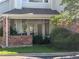 Exterior showing brick accents, and manicured landscaping enhance curb appeal at 13782 E Lehigh Ave # H, Aurora, CO 80014