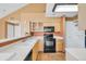 Well-equipped kitchen features modern appliances and ample cabinet space at 13782 E Lehigh Ave # H, Aurora, CO 80014