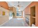 Spacious living area with a fireplace, big windows, and natural light at 13782 E Lehigh Ave # H, Aurora, CO 80014