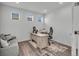 Comfortable office space with modern desk, chair, and neutral color scheme at 6591 N Ceylon St, Denver, CO 80249