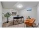 Home office in the basement with a desk and comfortable chair at 3734 Miller Ct, Wheat Ridge, CO 80033
