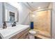 Simple bathroom with a single vanity and a walk-in shower at 5562 Rim View Pl, Parker, CO 80134