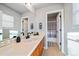 Stylish bathroom with single vanity and a walk-in shower at 5562 Rim View Pl, Parker, CO 80134