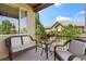 Charming balcony offers outdoor seating and views of the surrounding neighborhood and clear blue skies at 10064 Bluffmont Ct, Lone Tree, CO 80124