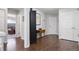 Hallway featuring hardwood floors, a console table and natural light at 4976 S Nelson St # A, Littleton, CO 80127
