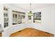 Cozy dining area with large windows, providing plenty of natural light at 8270 S High Ct, Centennial, CO 80122