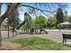 Modern green playground with slides, climbing structures, and ample space for fun at 8270 S High Ct, Centennial, CO 80122