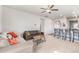 Spacious living room with two sofas, a coffee table and a view into the kitchen at 1152 Payton Ave, Fort Lupton, CO 80621