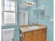Bright bathroom showcasing vanity, toilet, and mirror at 3109 S Jebel Way, Aurora, CO 80013