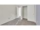 Neutral bedroom with carpet and closet doors at 3109 S Jebel Way, Aurora, CO 80013