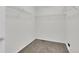 Walk-in closet with carpet flooring and shelving at 3109 S Jebel Way, Aurora, CO 80013