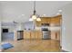 Updated kitchen with stainless steel appliances and wood cabinets at 3109 S Jebel Way, Aurora, CO 80013