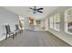 Spacious living room open to the kitchen with modern lighting and flooring at 3109 S Jebel Way, Aurora, CO 80013