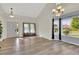 Bright living room with vaulted ceiling, bay windows, and hardwood floors at 3109 S Jebel Way, Aurora, CO 80013