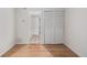 Bedroom with wood flooring and built-in closet at 1777 Larimer St # 2209, Denver, CO 80202