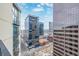 High-rise city view from a condo, featuring modern buildings and urban streetscape at 1777 Larimer St # 2209, Denver, CO 80202