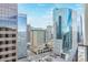 High-rise city view from a condo balcony, showcasing modern architecture and urban landscape at 1777 Larimer St # 2209, Denver, CO 80202