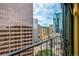 Stunning city views from a condo balcony, showcasing the urban landscape below at 1777 Larimer St # 2209, Denver, CO 80202