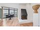 Modern dining area with city views and a fireplace at 1777 Larimer St # 2209, Denver, CO 80202