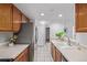 Bright kitchen, stainless steel appliances, wood cabinets at 1777 Larimer St # 2209, Denver, CO 80202