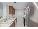 Kitchen boasts stainless steel appliances and wood cabinets at 1777 Larimer St # 2209, Denver, CO 80202