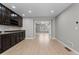 Basement featuring a wet bar, hardwood floors, and recessed lighting at 1815 Avery Way, Castle Rock, CO 80109