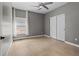 Bedroom with hardwood floors, natural light, and access to closet at 1815 Avery Way, Castle Rock, CO 80109