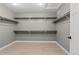 Walk-in closet with built-in shelves and lots of storage space, perfect for keeping your wardrobe organized at 1815 Avery Way, Castle Rock, CO 80109
