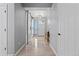 Bright foyer with modern light fixture, barn doors, and ceramic tile at 1815 Avery Way, Castle Rock, CO 80109