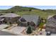 Charming two-story home with a landscaped front yard and a three-car garage, perfect for families at 1815 Avery Way, Castle Rock, CO 80109