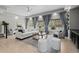 Spacious living room with ample natural light, modern furniture, and an open concept design at 1815 Avery Way, Castle Rock, CO 80109
