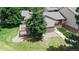 Aerial view of the home showcasing its well-maintained lawn, trees and back deck at 1006 Homestake Dr # 1D, Golden, CO 80401
