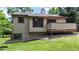 Well-maintained backyard with lush lawn, deck, and beautiful landscaping at 1006 Homestake Dr # 1D, Golden, CO 80401