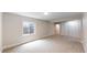 Finished basement with a window, carpeted floors and storage space at 1006 Homestake Dr # 1D, Golden, CO 80401