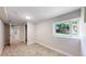 Cozy bedroom with large window, neutral carpet, and ample natural light at 1006 Homestake Dr # 1D, Golden, CO 80401