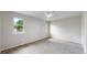 Spacious, light-filled bedroom features two windows and soft neutral carpet at 1006 Homestake Dr # 1D, Golden, CO 80401